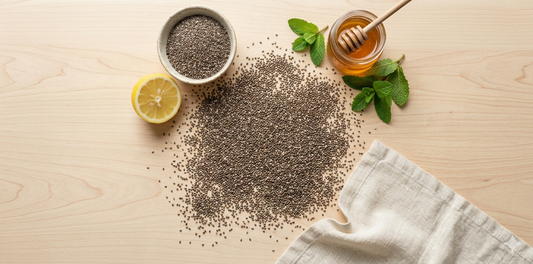 Organic chia seeds scattered on wooden surface with lemon and honey — Herbora Pakistan